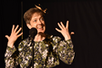 Erika-MacDonald-performing-The-Barn-Identity-at-Cincy-Fringe-photo-by-Kelsey-Trusty52120966425_a97e664116_o.png